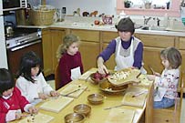 Cutting apples for applesauce day