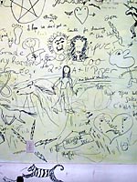 June 26 - Close-up of drawings on farmhouse wall before it's torn down